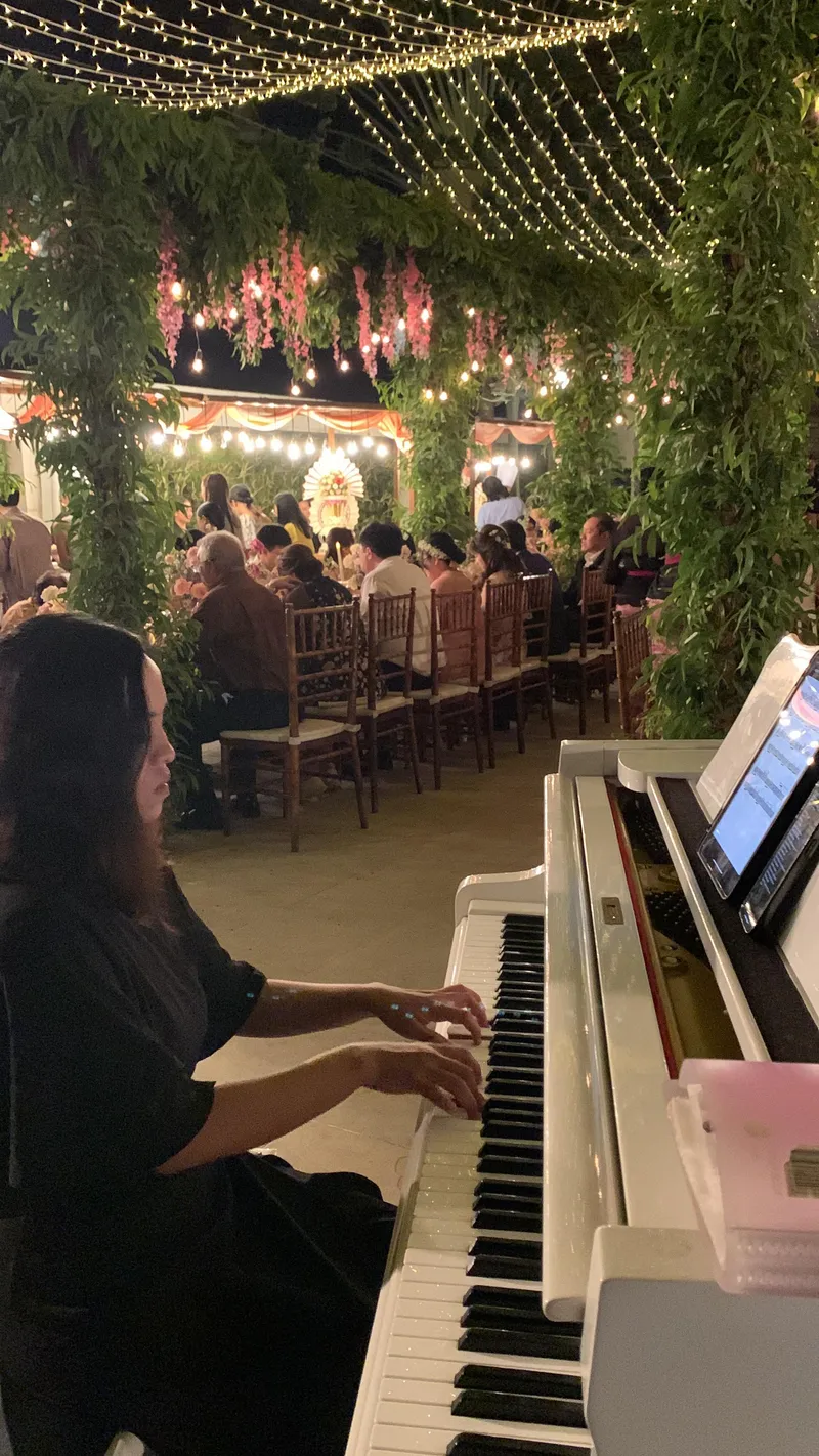 Garden reception with live wedding pianist, Bali